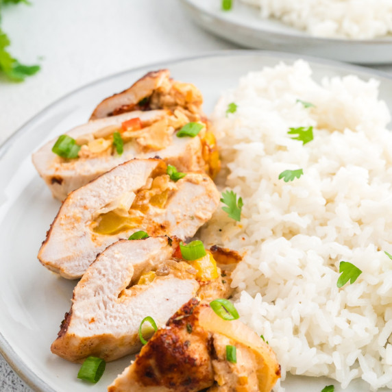 fajita stuffed chicken served with white rice