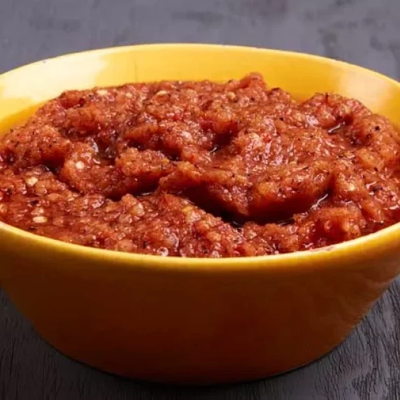 Grilled tomato salsa served in a bowl