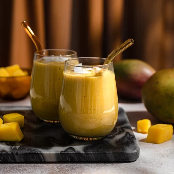 Kombucha smoothie arranged in a 2 cups with straw