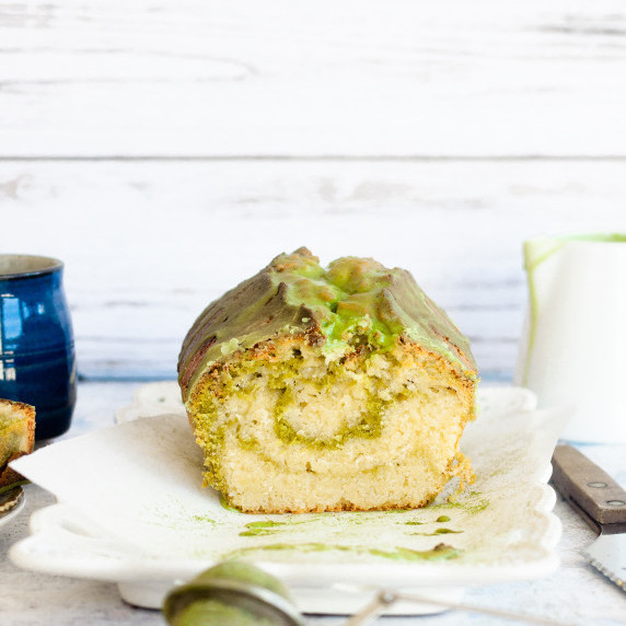 matcha marble pound cake on a white plate