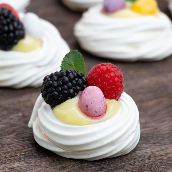 meringue nest with lemon custard and berries