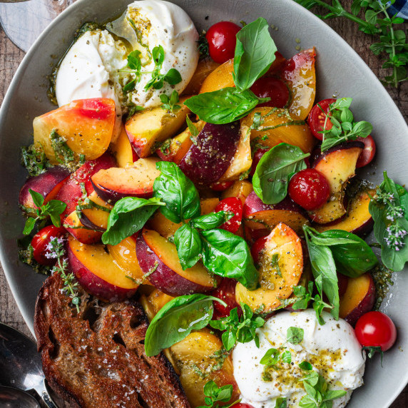 peach caprese salad in a bowl