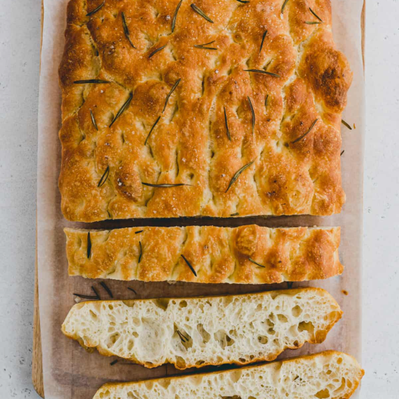 homemade focaccia with rosemary sprigs