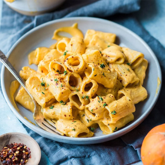 Bowl of creamy pumpkin mac and cheese.