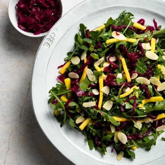 Sauerkraut Mango Salad arranged in a white plate
