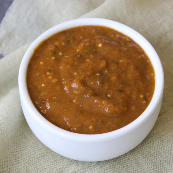 A small bowl of Mexican verde sauce