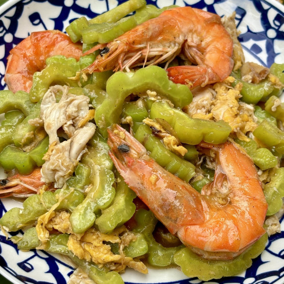 Stir-fried bitter melon with egg and shrimp served.