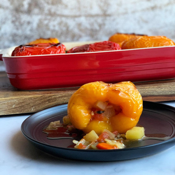 Stuffed bell peppers in a dish and in a plate