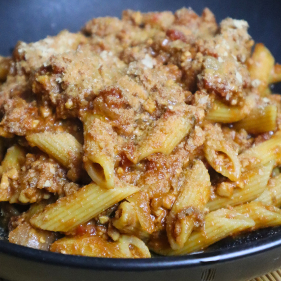 pasta with tempeh and mushrooms bolognese in a plate