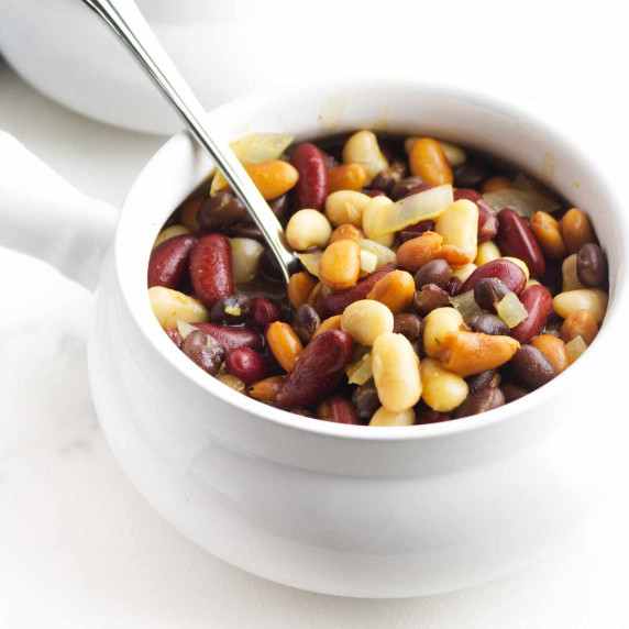 soup bowl full of multi colored cowboy beans.