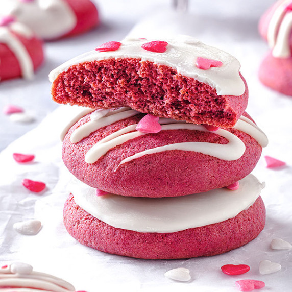 Valentine Cookies decorated with white chocolate glaze and heart sprinkles