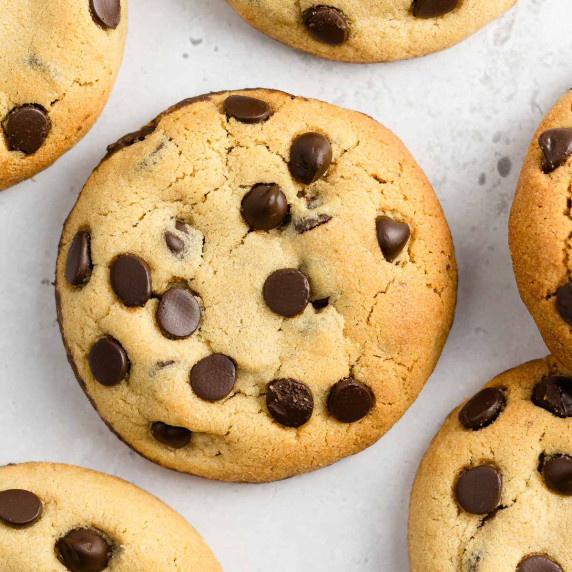 Wowbutter chocolate chip cookies on a white surface.